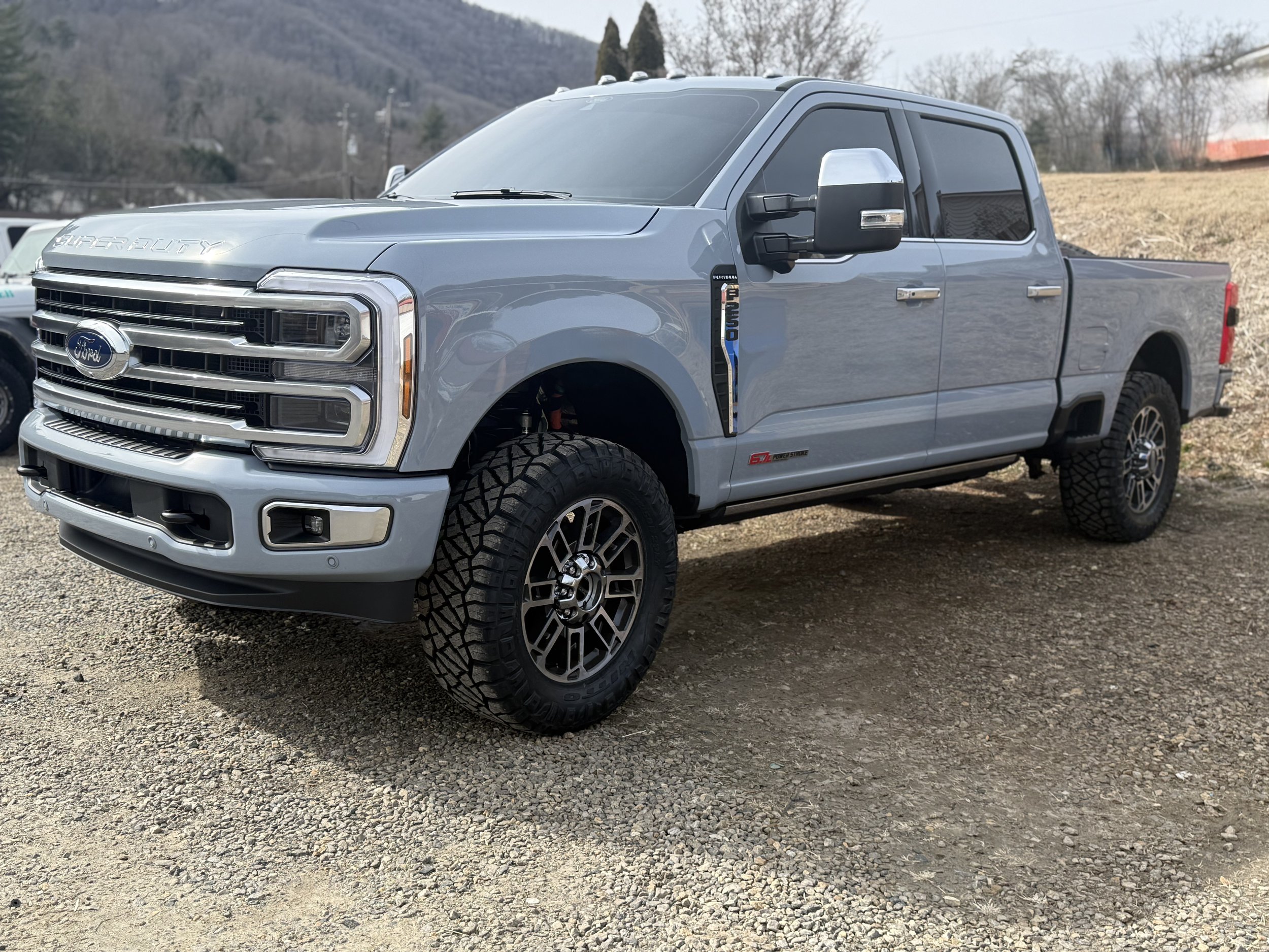 Ford F-250 Super Duty with custom wheels and all-terrain tires