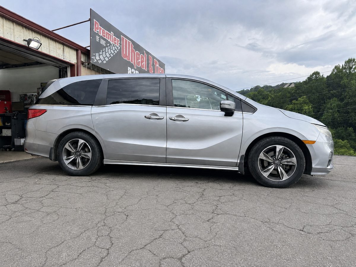 Silver Honda Odyssey minivan at Premier Wheel & Tire of WNC